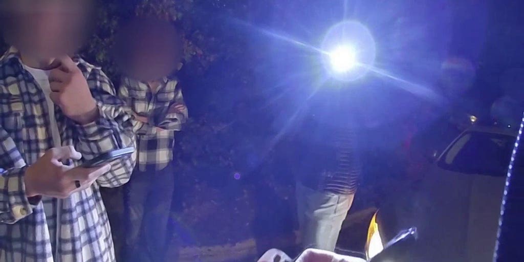 Idaho police bodycam captured group of people walking near crime scene ...