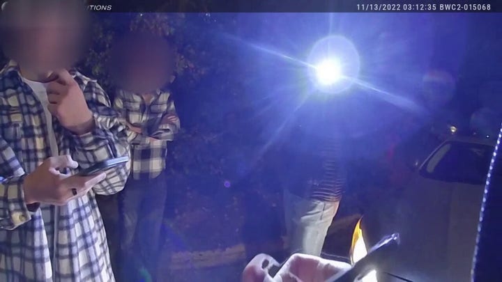 An Idaho police bodycam captured a group of people walking near crime scene on night of murders