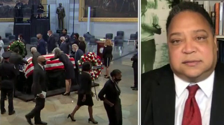 John Lewis' godson: Experience of John Lewis is an authentic America experience