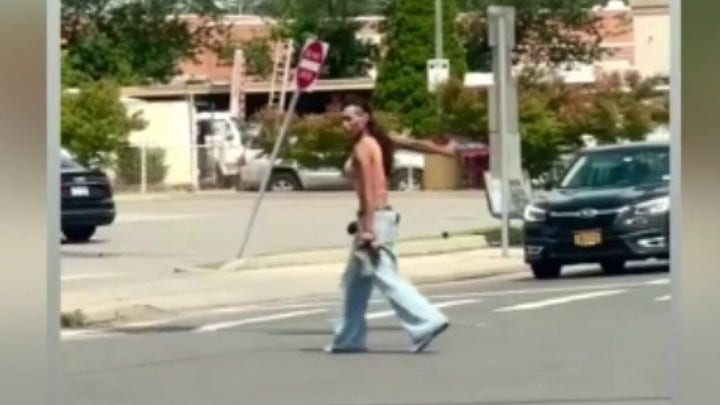 Video shows Long Island officer mow down gun-toting suspect at busy intersection