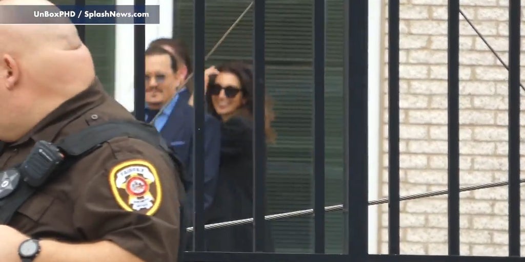 Johnny Depp and lawyer Joelle Rich spotted smiling outside Fairfax