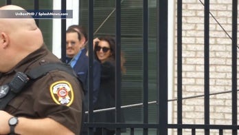 Johnny Depp and lawyer Joelle Rich spotted smiling outside Fairfax Virginia Court House 