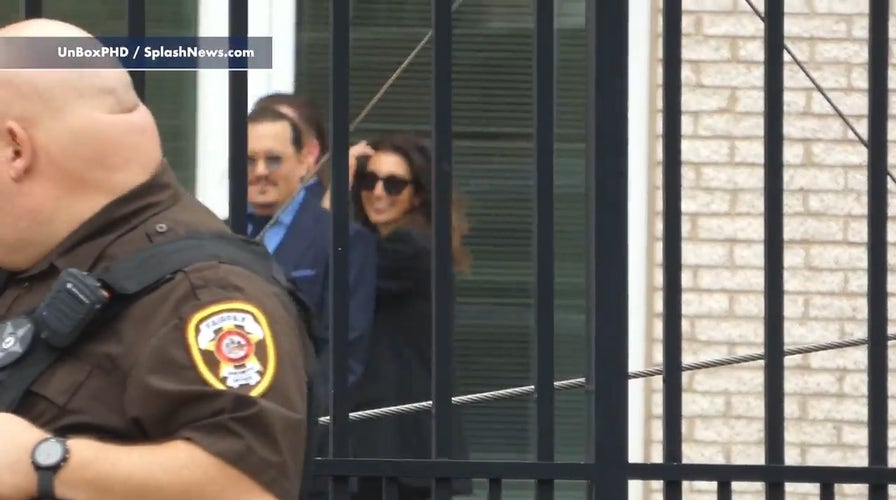 Johnny Depp and lawyer Joelle Rich spotted smiling outside Fairfax Virginia Court House 
