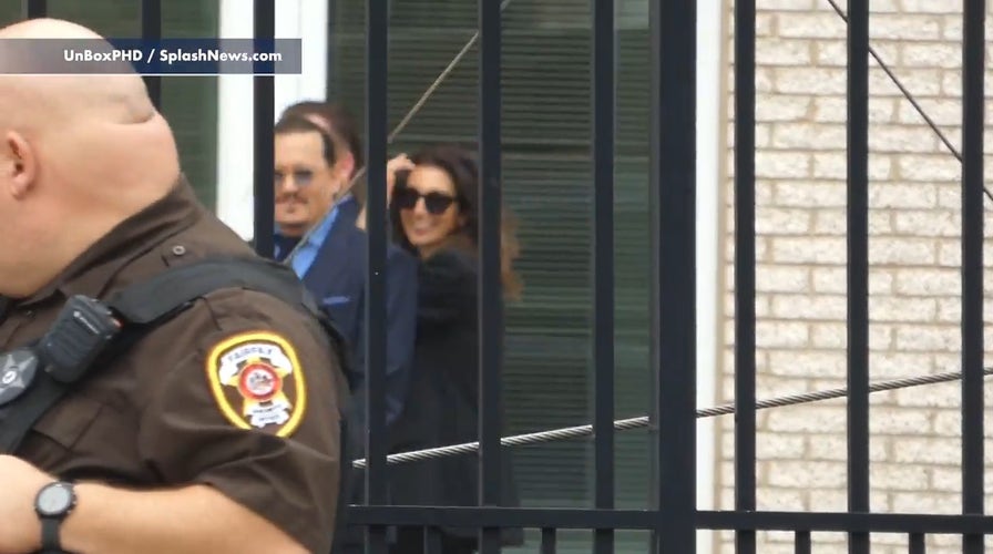 Johnny Depp and lawyer Joelle Rich spotted smiling outside Fairfax Virginia Court House 