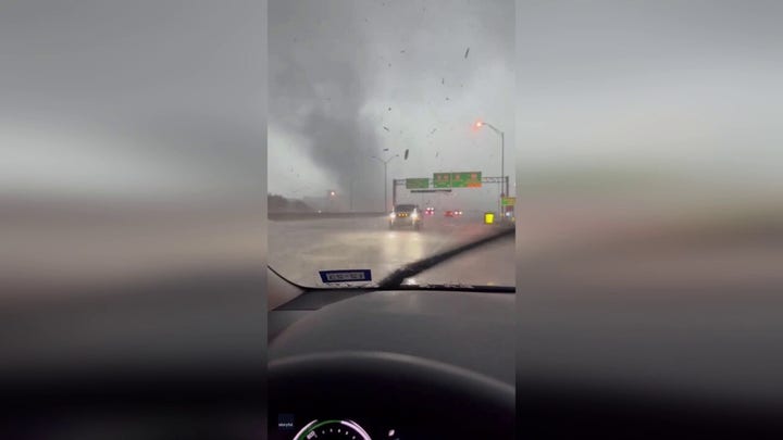 Watch as a tornado is spotted by a motorist in northeast Texas