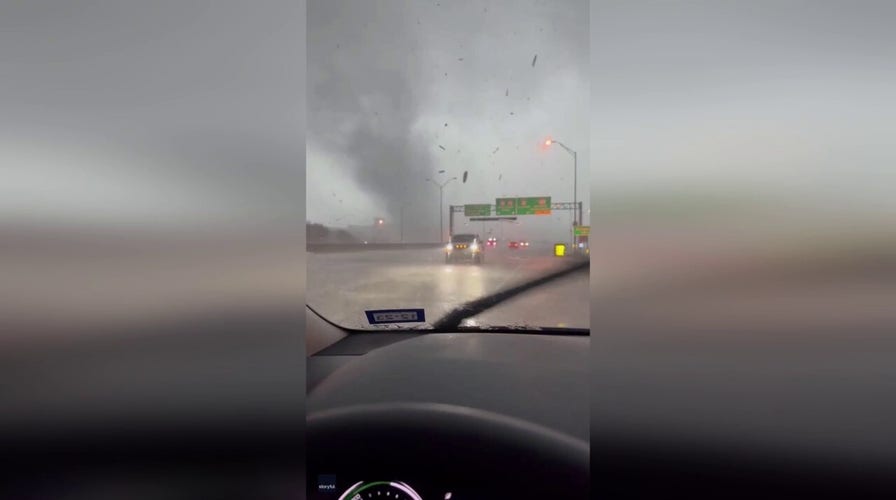 Watch as a tornado is spotted by a motorist in northeast Texas