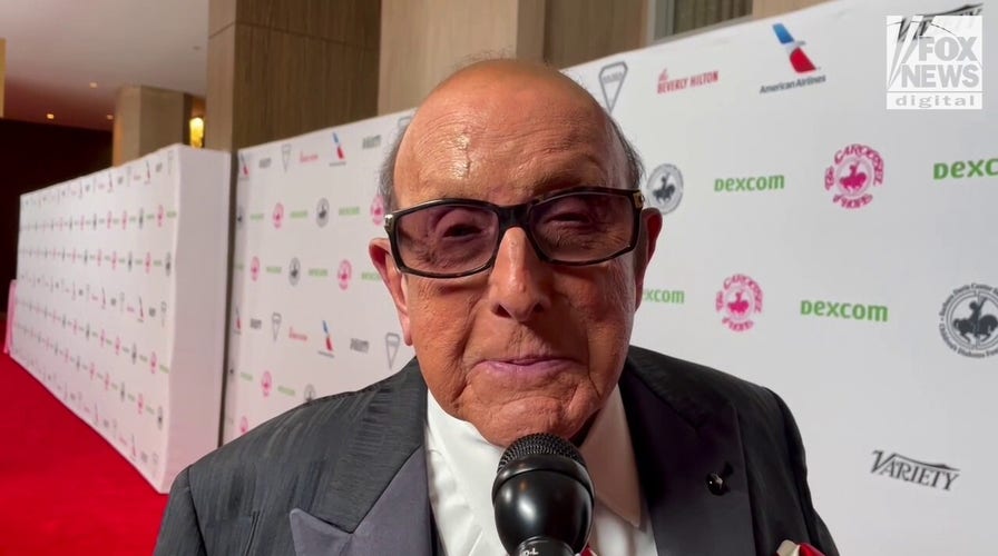 Clive Davis applauds the upcoming Whitney Houston film for delving into 'the real person' 