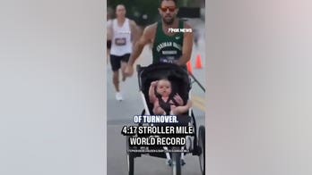 Dad BREAKS world record with 4:14 baby stroller mile