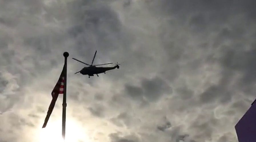 Marine One flies over crowd of Trump supporters 