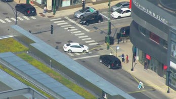 Illinois mayor's security detail exchanges gunfire with robbers, stops robbery
