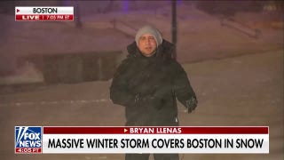 Boston authorities warn residents to stay off roads during snow storm