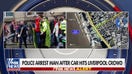 Police arrest 53-year-old man after car drives into Liverpool crowd