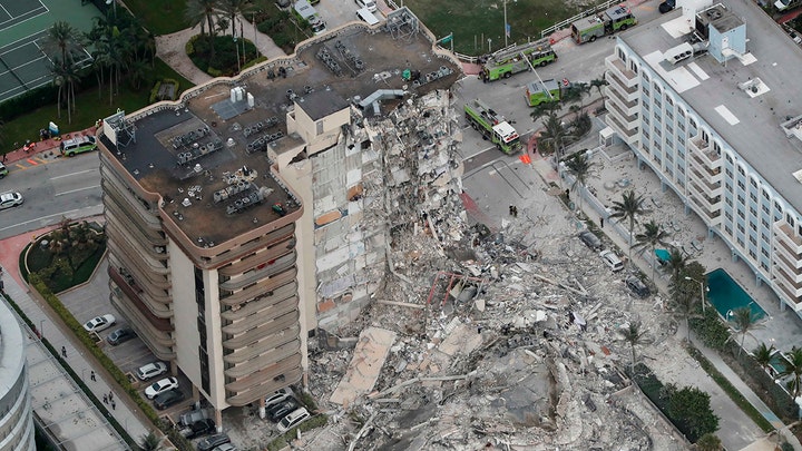 Officials hold a briefing on the Surfside building collapse