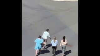 Children escorted across parking lot following school shooting n Nashville - Fox News
