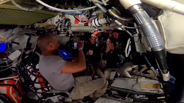 Artemis II crew awards astronaut Jeremy Hansen with gold pin in milestone moment