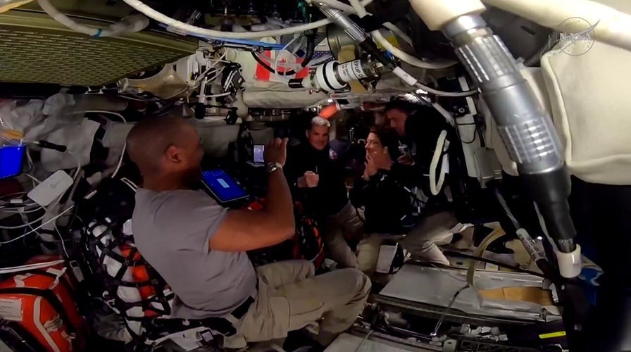 Artemis II unit awards astronaut Jeremy Hansen with golden pin successful milestone moment