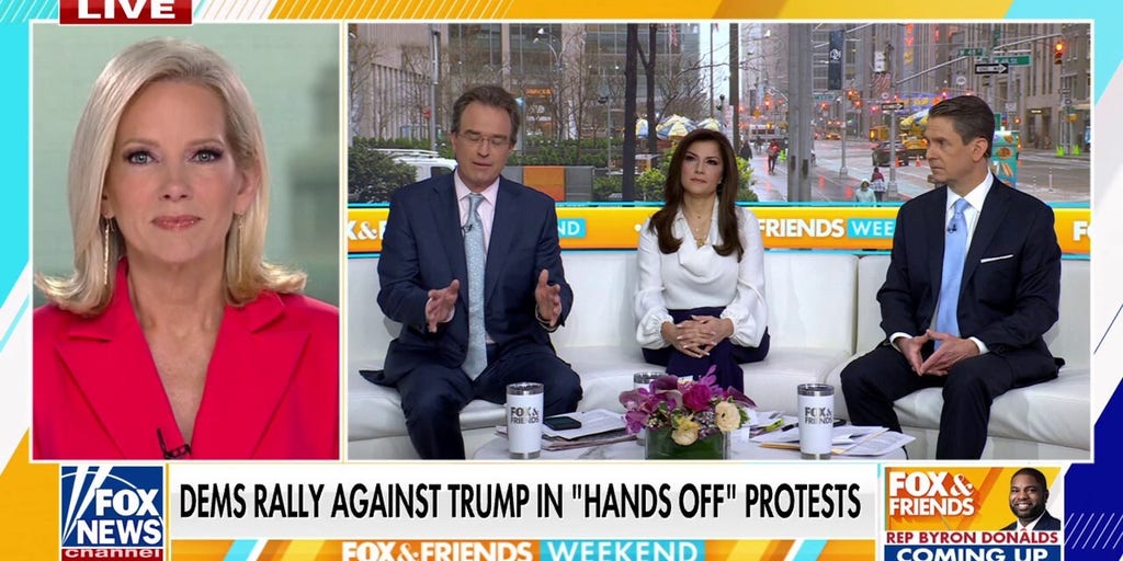 Dems rally against Trump in 'Hands off' protest of the president's policies