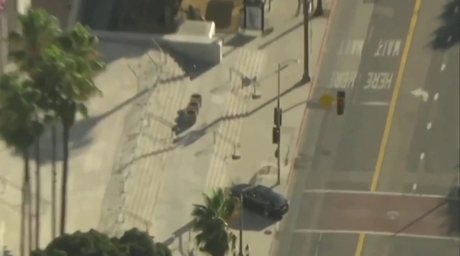 LA City Hall evacuated after incident involving car traveling onto sidewalk in front of building