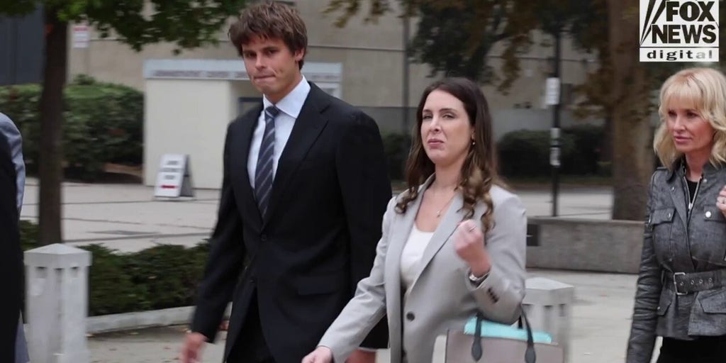 Fraser Bohm leaves court with his family