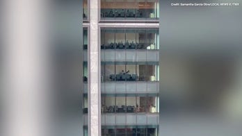 "Hi-ya"! Hilarious footage shows a man doing martial arts in a New York office building