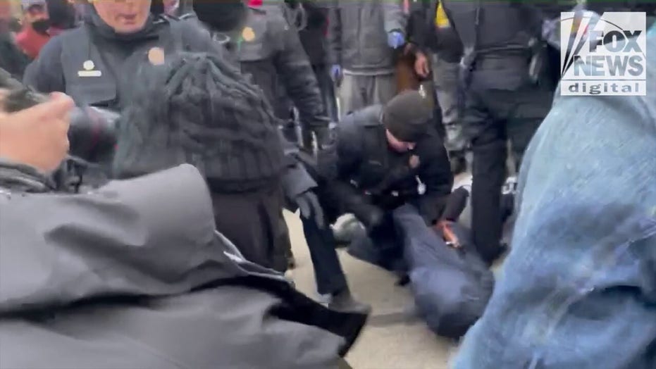 Anti-Rittenhouse protestor body-slams reporter outside Kenosha courthouse, arrested for battery