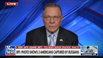 2 American fighters seen in photos being held by Russian forces in Ukraine