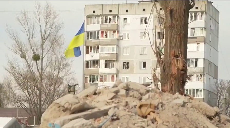 Ukrainian civilians struggle to grasp destruction left by Russian troops