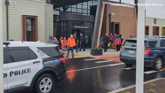 Environmental activists arrested for blocking airplane traffic at Massachusetts airfield