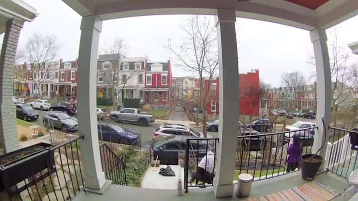 VIDEO: Driver hops curb in allegedly stolen car, nearly hitting woman and dog on sidewalk