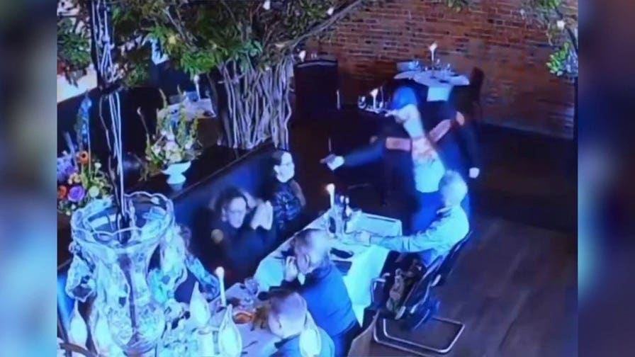 Former attorney allegedly pulls gun on ex-wife in shocking restaurant surveillance video