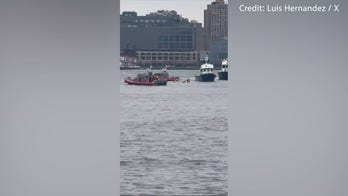 Rescue crews on scene at Hudson River helicopter crash