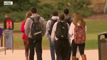 Should college students who test positive for COVID-19 be kept on campus?