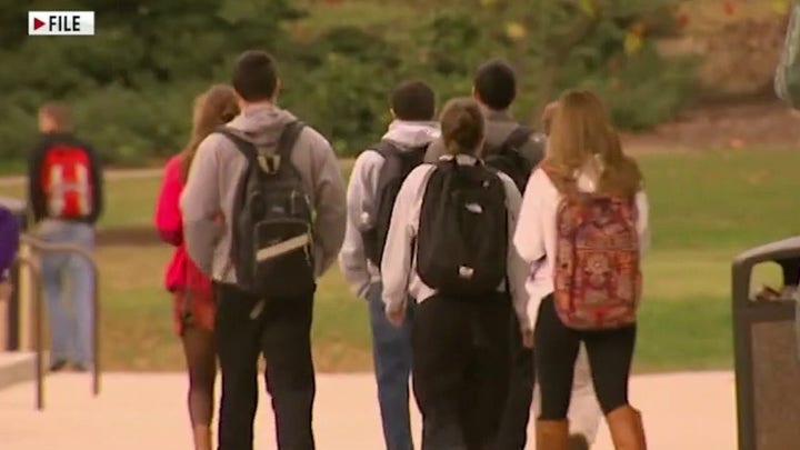 Should college students who test positive for COVID-19 be kept on campus?