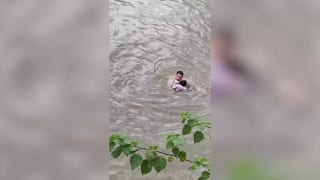Fast-flowing river rescue: Man jumps in after floating little girl - Fox News