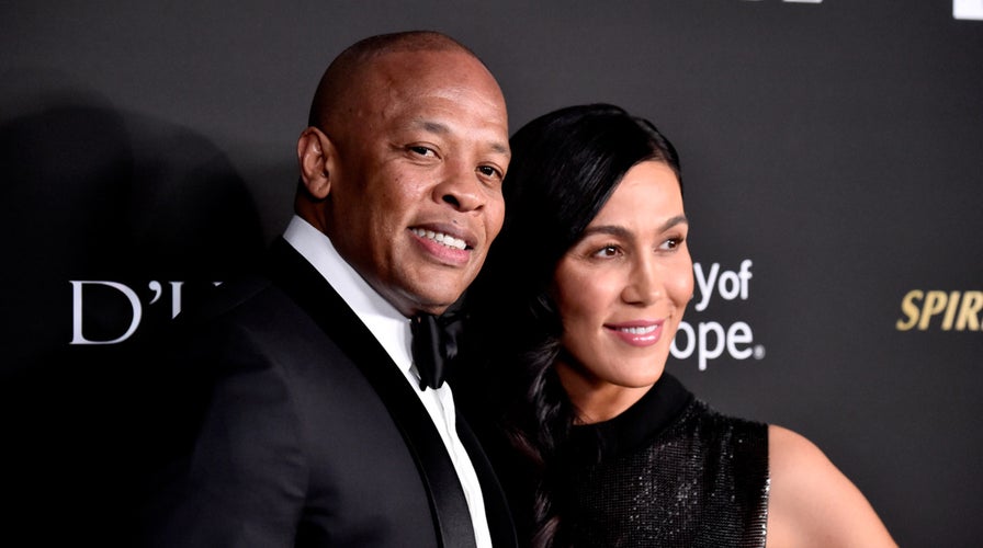 Dr. Dre's ex-wife Nicole Young avoids question about allegedly serving producer at grandmother's burial.