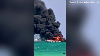 Dramatic video captures Florida tourist boat engulfed in flames as passengers flee