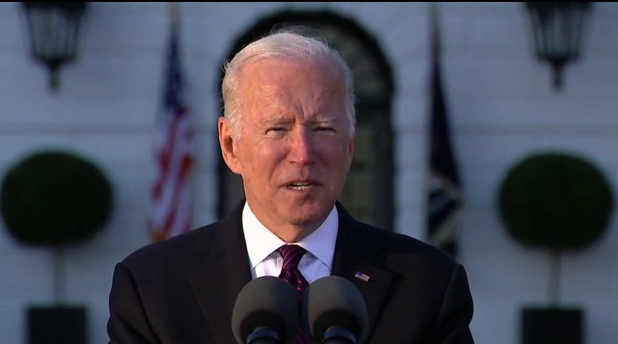 Biden inks infrastructure deal amid slumping polls 