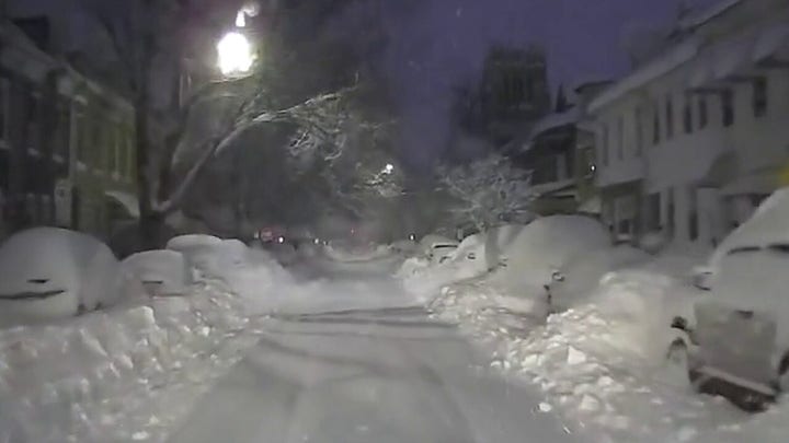 Nor'easter buries East Coast in heavy snow
