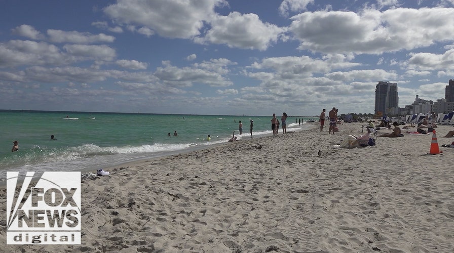 Miami Beach loosens outpouring  interruption  restrictions, cracks down   connected  crime