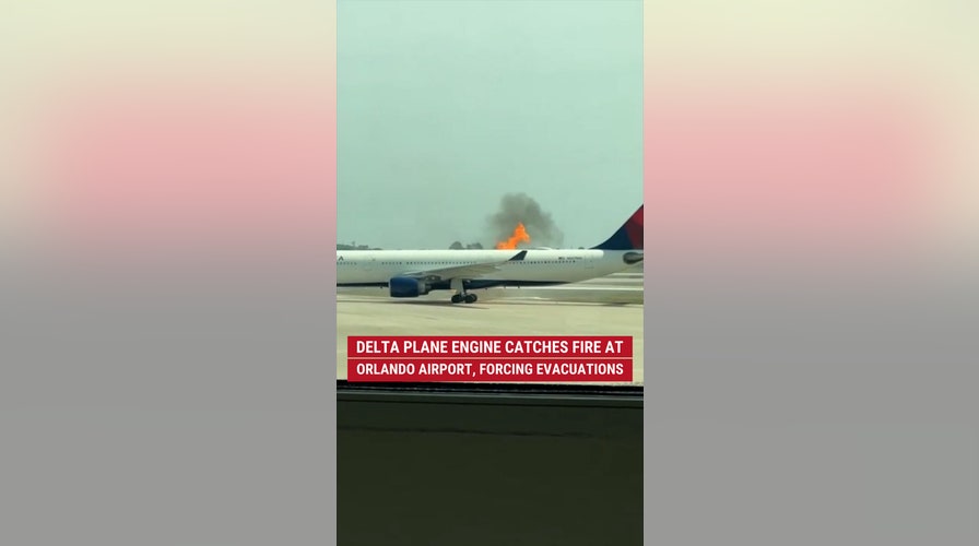 Delta plane engine catches fire at Orlando airport, forcing evacuations