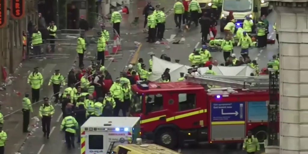 Police, emergency crews in Liverpool respond after vehicle plows into soccer fans