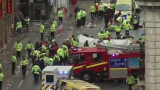 Police, emergency crews in Liverpool respond after vehicle plows into soccer fans
