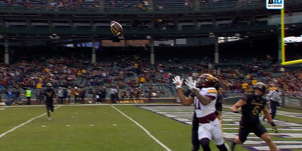 Javon Tracy catches a 28-yard pass for his third TD of the game, Minnesota extends lead over Northwestern