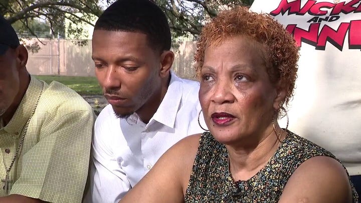 The mother of an armed robbery suspect killed by an armed suspect speaks up