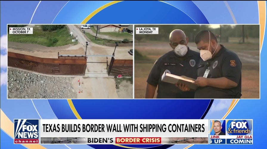 Texas begins building makeshift border wall with shipping containers 