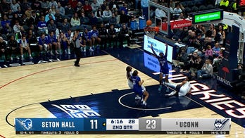 KK Arnold finishes the tough and-1 steal, extending UConn's lead over Seton Hall