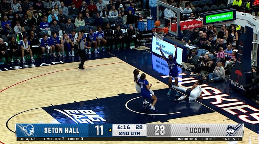 KK Arnold finishes the tough and-1 steal, extending UConn's lead over Seton Hall