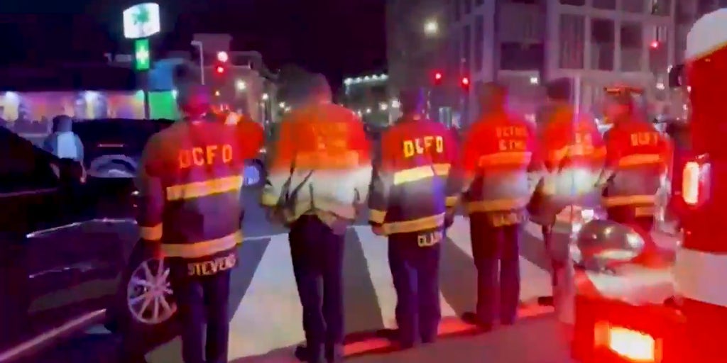 DC firefighters honor National Guard member Beckstrom during dignified transfer