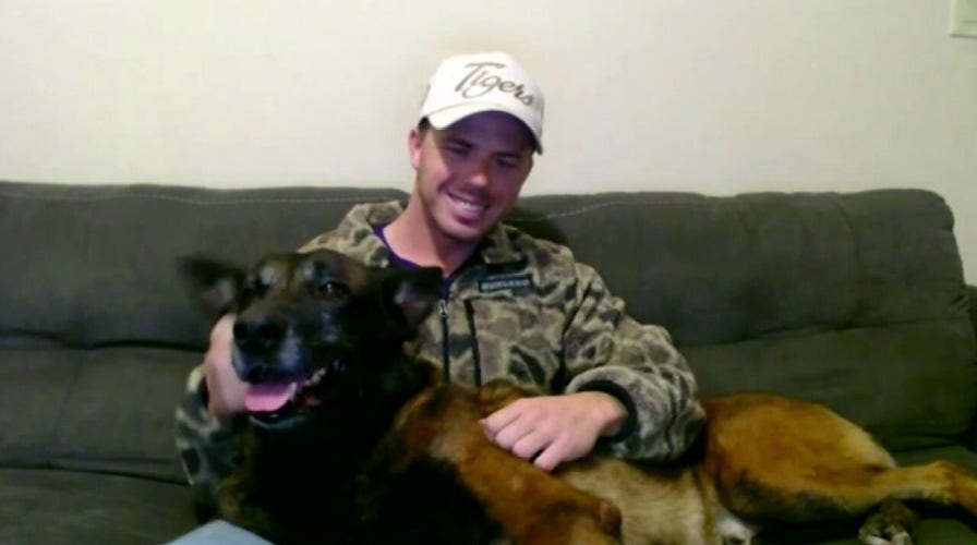 US servicemember reunites with retired military service dog