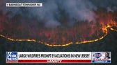 Large wildfires prompt evacuations in New Jersey